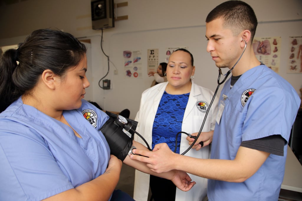 photo of CET medical students taking blood pressure readings